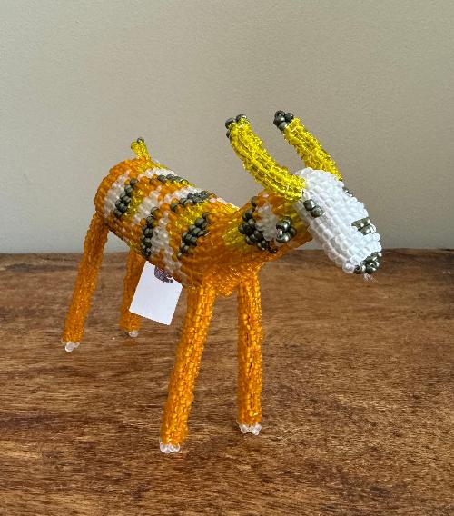 This charming Beaded Antelope from Monkeybiz captures the elegance of African wildlife through expert beadwork.