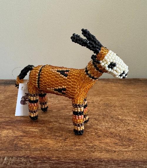 This charming Beaded Antelope from Monkeybiz captures the elegance of African wildlife through expert beadwork.