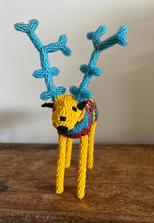 Celebrate the festive season with a touch of whimsy through the vibrant artistry of Monkeybiz’s handcrafted Beaded Reindeer