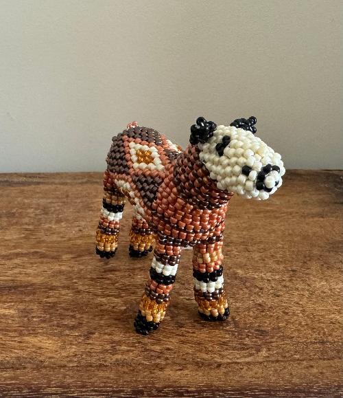 The Beaded Zebra from Monkeybiz showcases the bold beauty of this iconic animal, reimagined through the art of beading.